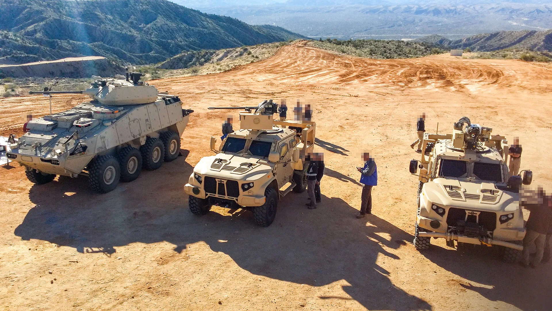 LAV and two JLTVs equipped with BNC Gun-Control-Unit controlled cannons.