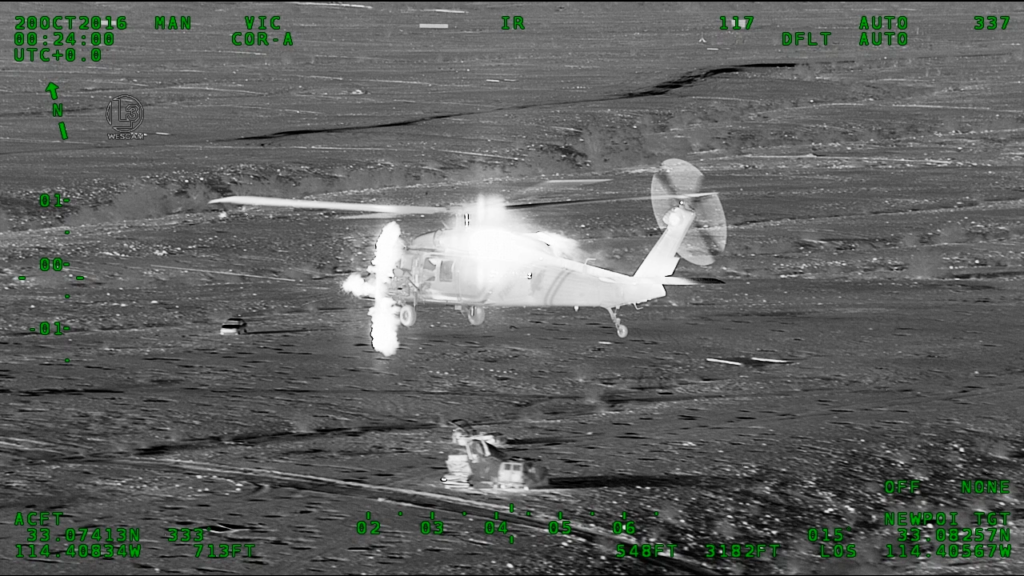 M230-equipped blackhawk firing mid-flight. Infrared capture.